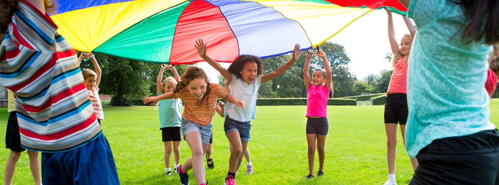 Kids playing with parachute