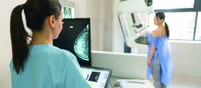 Image of a women and digital mammography
