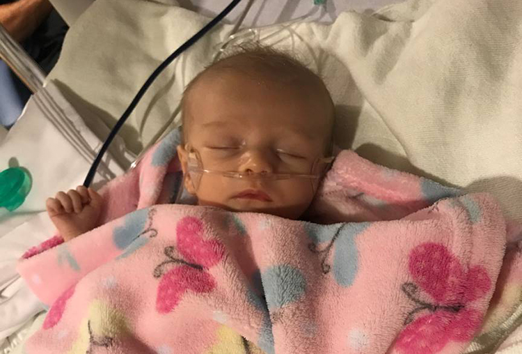 Maeva Miller, at six weeks hold, following surgery
