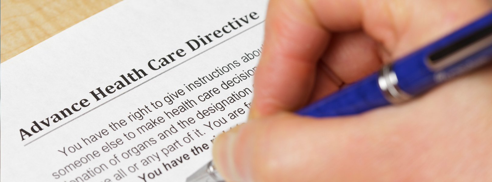 Individual filling out an advance care directive