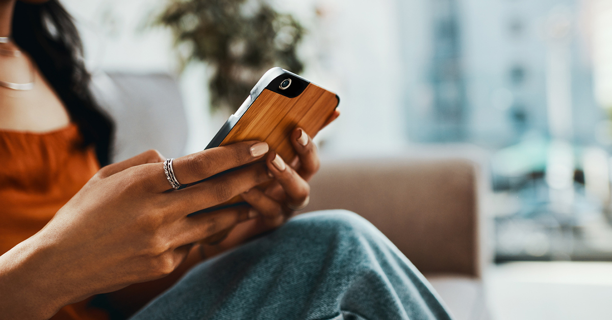 Woman reading information on her phone