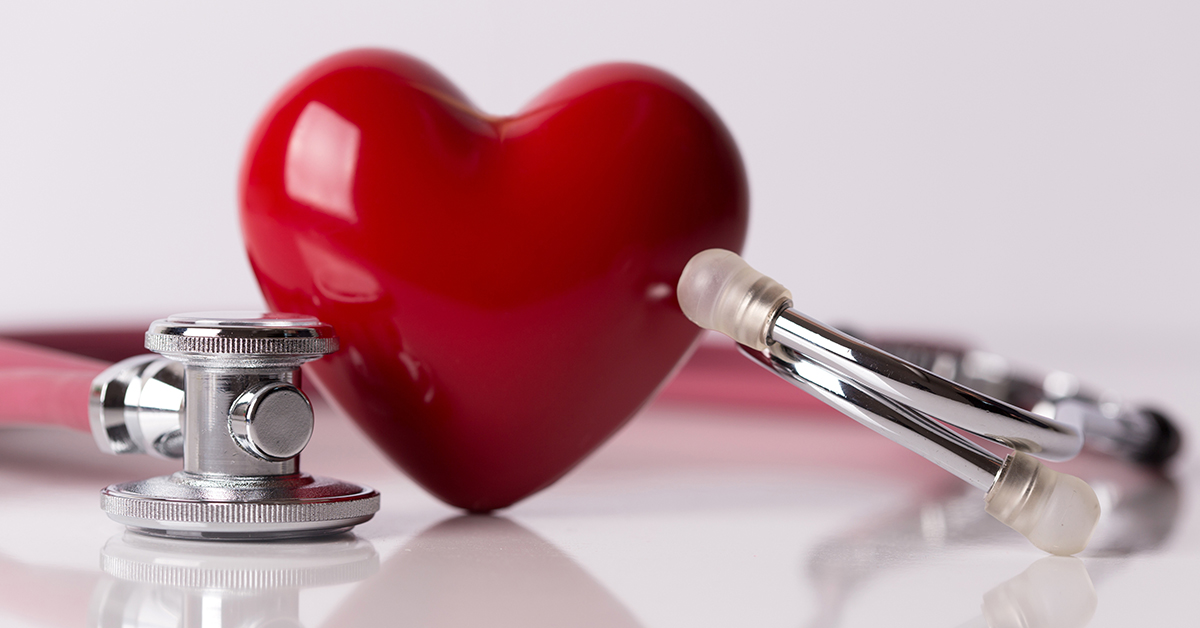 A red toy heart and stethoscope