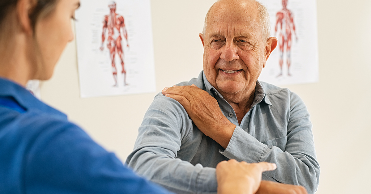Patient discussing joint pain with specialist