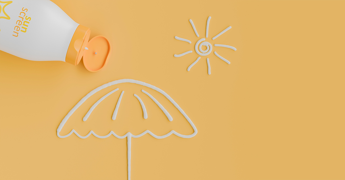 Bottle of sunscreen and lotion in the shape of the sun and sun umbrella
