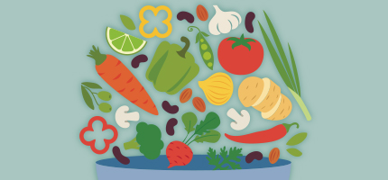 A bowl overflowing with a wide variety of vegetables